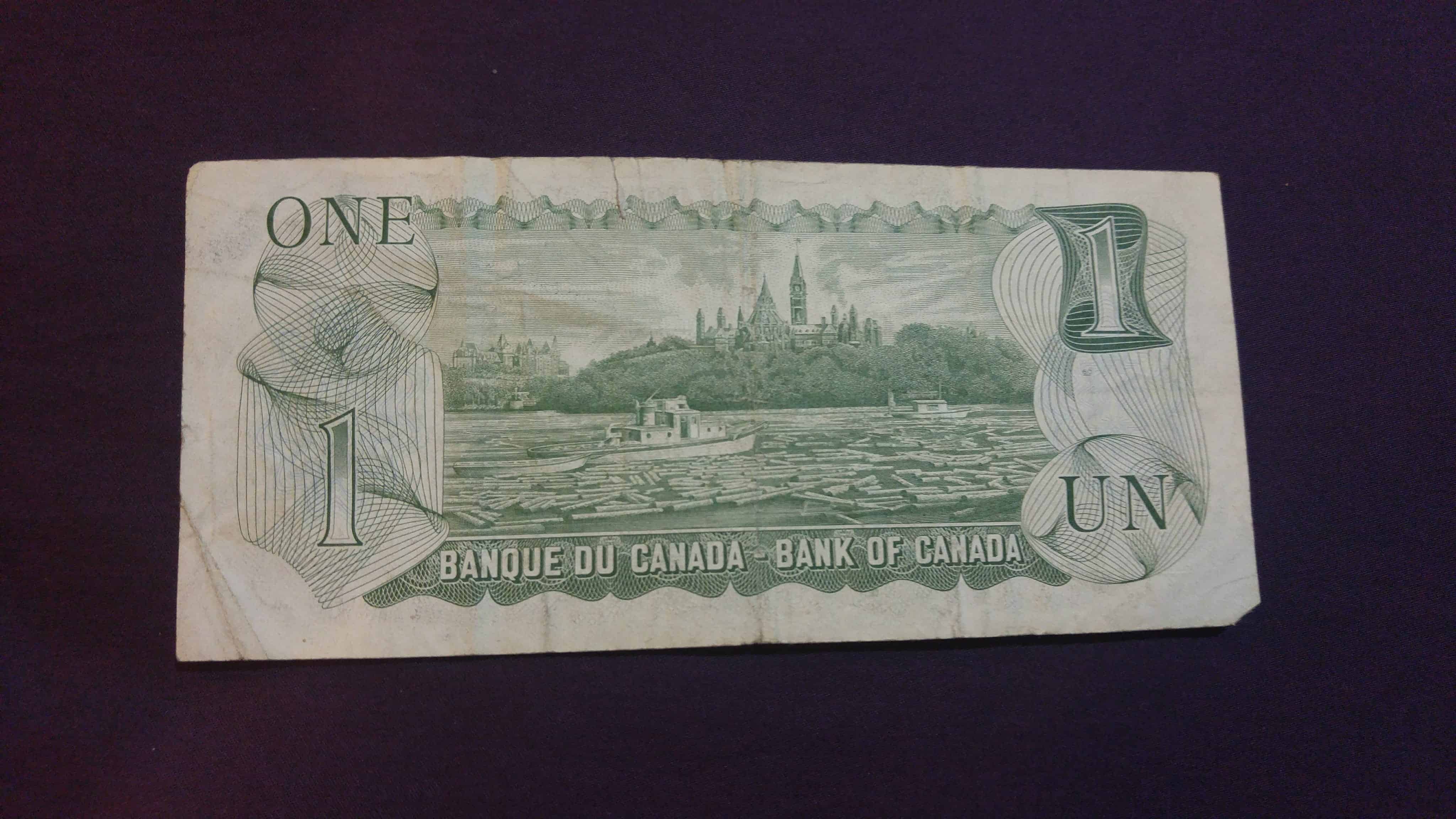 Canada: 1 Dollar (featuring Queen Elizabeth 2 of UK) back – thanks to Pvt. Ben Rees CF