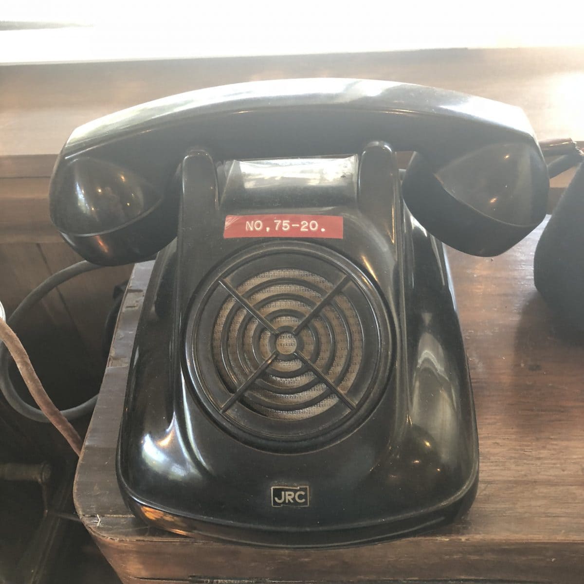 Artifacts: Phone, black, no dial (in a coffee shop in Nozawa Onsen)