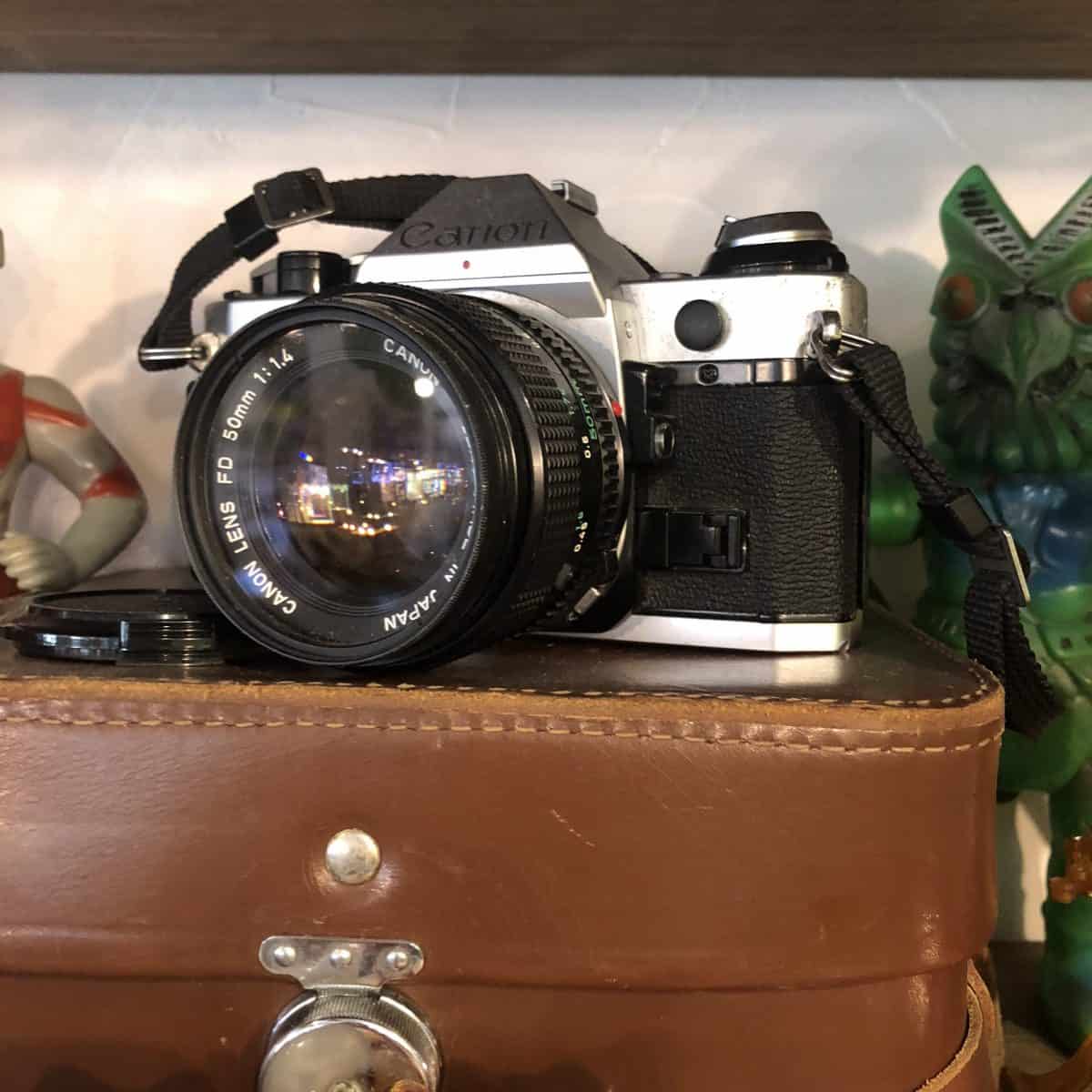 Artifacts: camera, Canon, 35mm, black/silver (in a coffee shop in Nozawa Onsen)